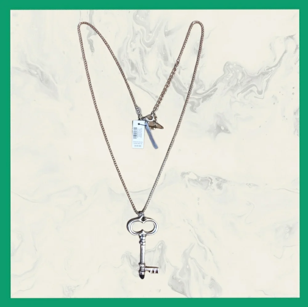Chico's Silvertone Key Necklace with styles. - Picture 5 of 5
